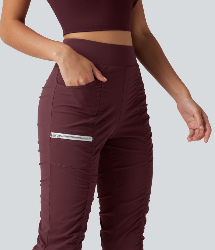 Pantalones ajustados de running de talle alto con fruncido, secado rápido y bolsillos.