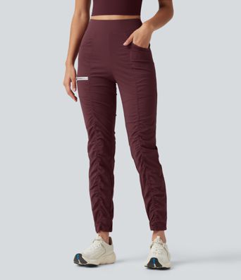 Pantalones ajustados de running de talle alto con fruncido, secado rápido y bolsillos.