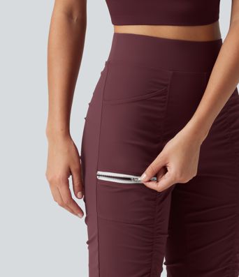 Pantalones ajustados de running de talle alto con fruncido, secado rápido y bolsillos.