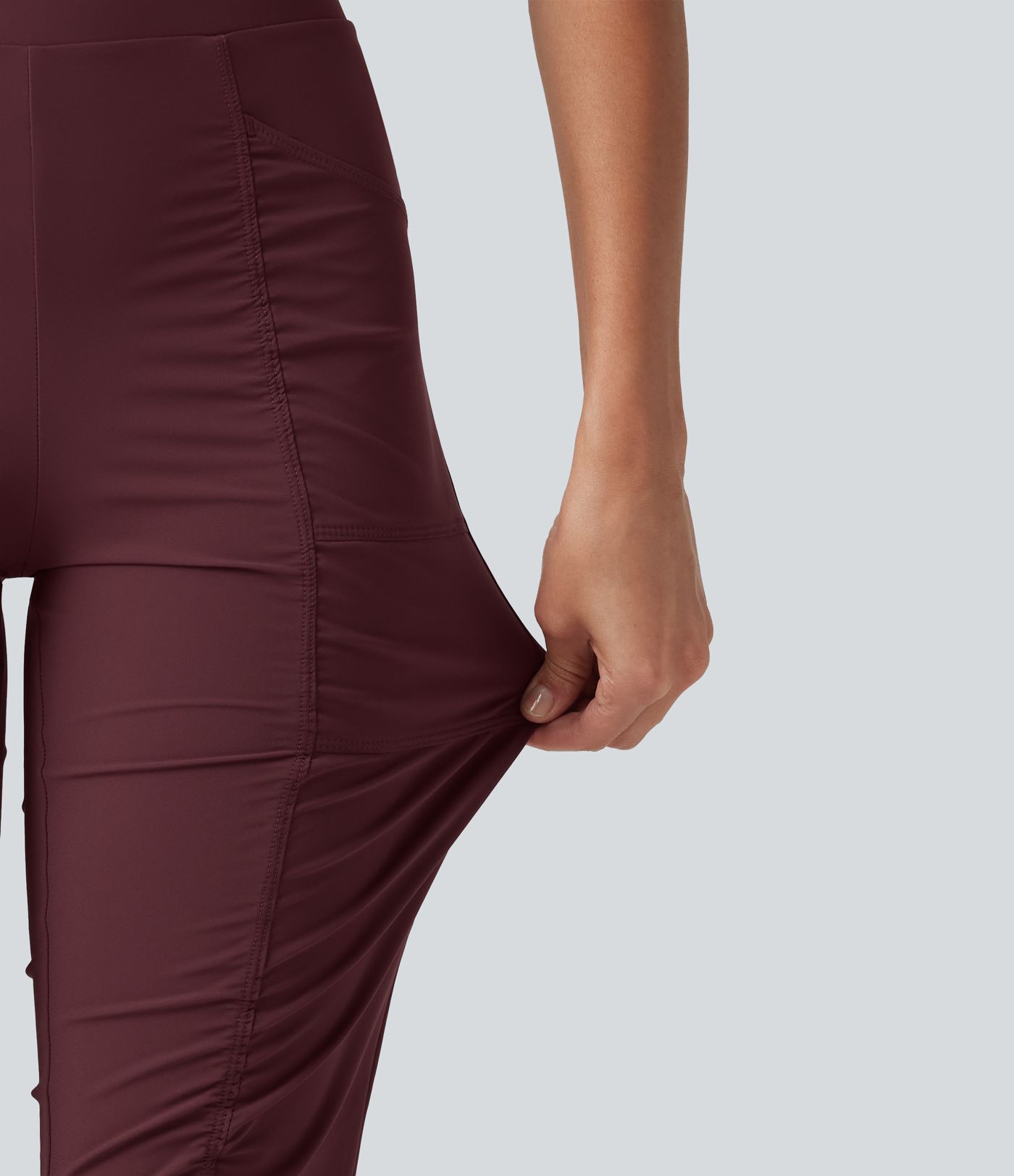 Pantalones ajustados de running de talle alto con fruncido, secado rápido y bolsillos.