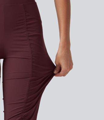 Pantalones ajustados de running de talle alto con fruncido, secado rápido y bolsillos.