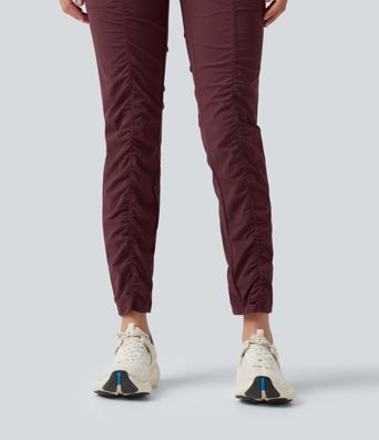 Pantalones ajustados de running de talle alto con fruncido, secado rápido y bolsillos.