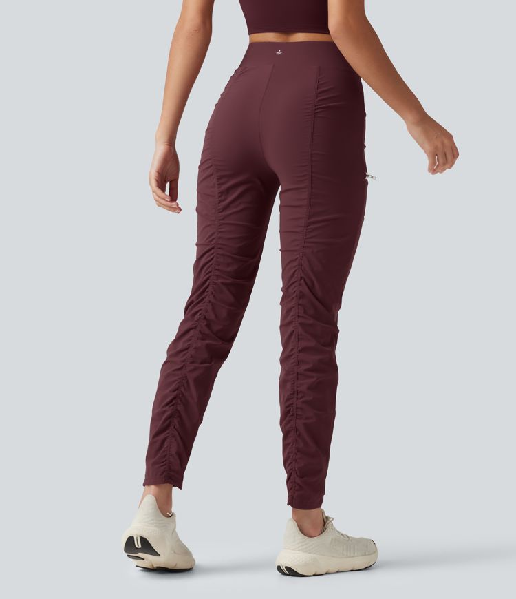 Pantalones ajustados de running de talle alto con fruncido, secado rápido y bolsillos.