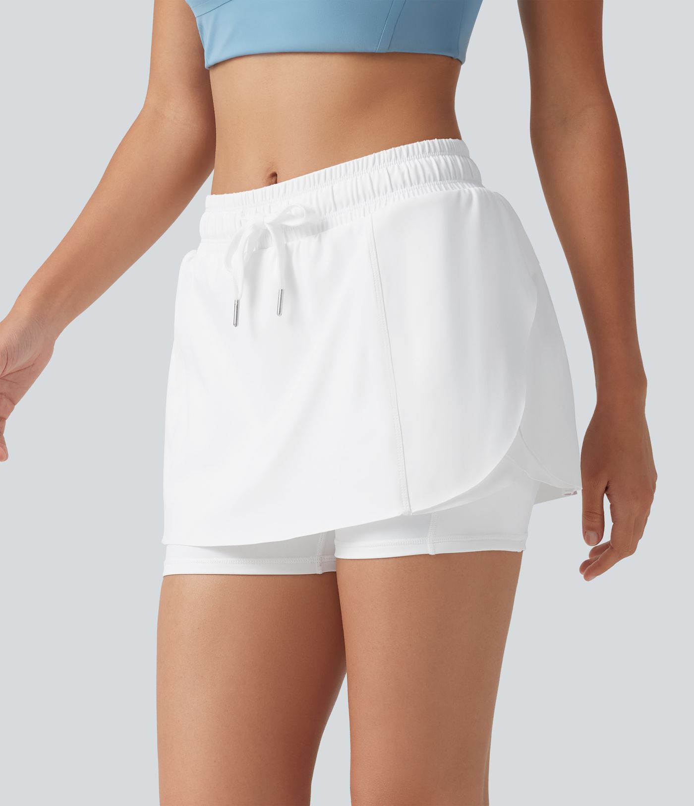 Softlyzero™ Airy Mid Rise Drawstring 2-in-1 Crossover Hem Cool Touch Mini Workout Skirt with Pockets