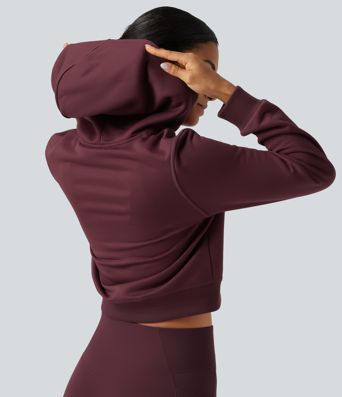 Fleece-Trainingsjacke mit Kapuze, Seitentaschen und langen Ärmeln Fleece-Trainingsjacke mit Kapuze, Seitentaschen und langen Ärmeln