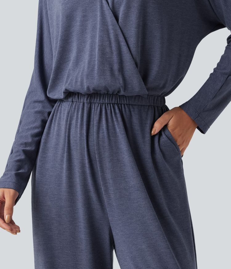 Büro-Jumpsuit mit V-Ausschnitt, Seitentaschen und langen Ärmeln Büro-Jumpsuit mit V-Ausschnitt, Seitentaschen und langen Ärmeln