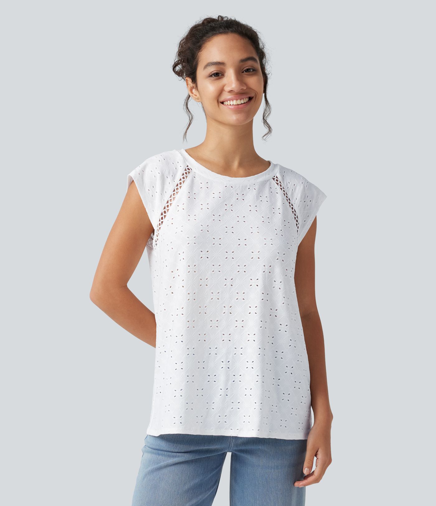 Blouse décontractée à col rond, mancherons, découpes et lien au dos