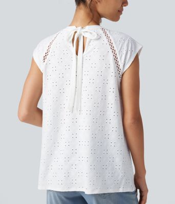 Blouse décontractée à col rond, mancherons, découpes et lien au dos