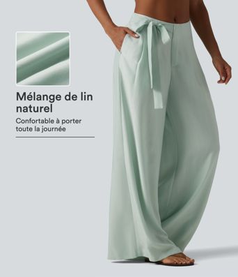 Pantalon large fluide taille haute en lin mélangé avec poches et liens latéraux Pantalon large fluide taille haute en lin mélangé avec poches et liens latéraux