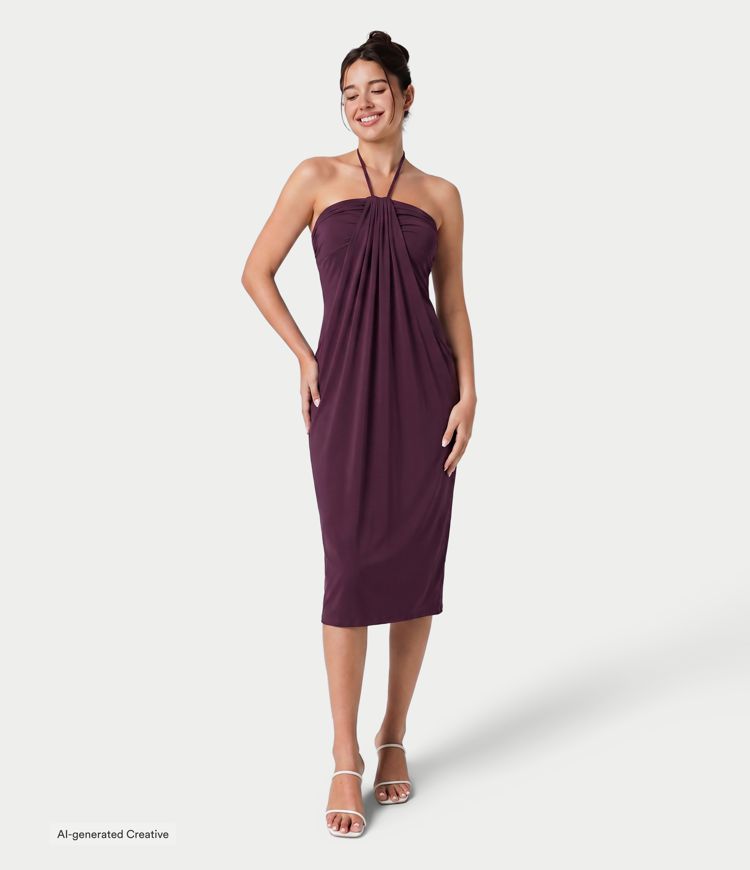 Vestido midi halter con lazo en la espalda y bolsillos Vestido midi halter con lazo en la espalda y bolsillos