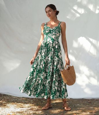 Robe longue resort décolleté cœur sans manches imprimé floral avec laçage Robe longue resort décolleté cœur sans manches imprimé floral avec laçage