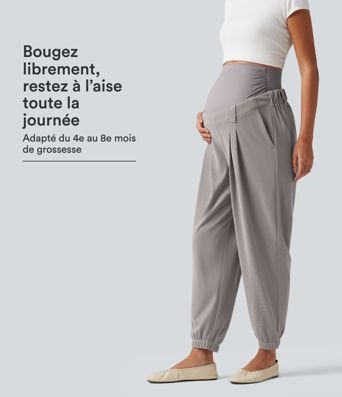 Pantalon de grossesse fuselé taille très haute en tissu gaufré avec poches
