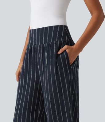 Lässige Hose mit hohem Bund, mehreren Taschen, Streifen und abgerundetem Saum