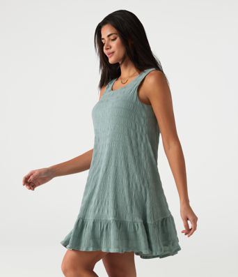 Vestido mini casual sin mangas con escote redondo, sujetador incorporado y bajo con volantes Vestido mini casual sin mangas con escote redondo, sujetador incorporado y bajo con volantes