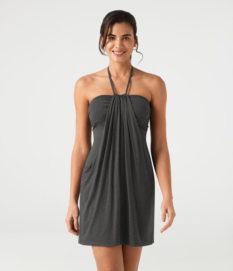 Vestido mini de estilo resort con escote halter que se anuda en la espalda y bolsillos Vestido mini de estilo resort con escote halter que se anuda en la espalda y bolsillos