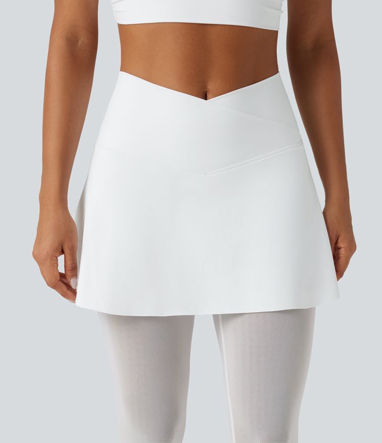 Softlyzero™ luftige, højtaljede crossover 2-i-1 leggings med kontrastmesh, InstantCool, med fodstrop og integreret nederdel, med lommer - UPF50+