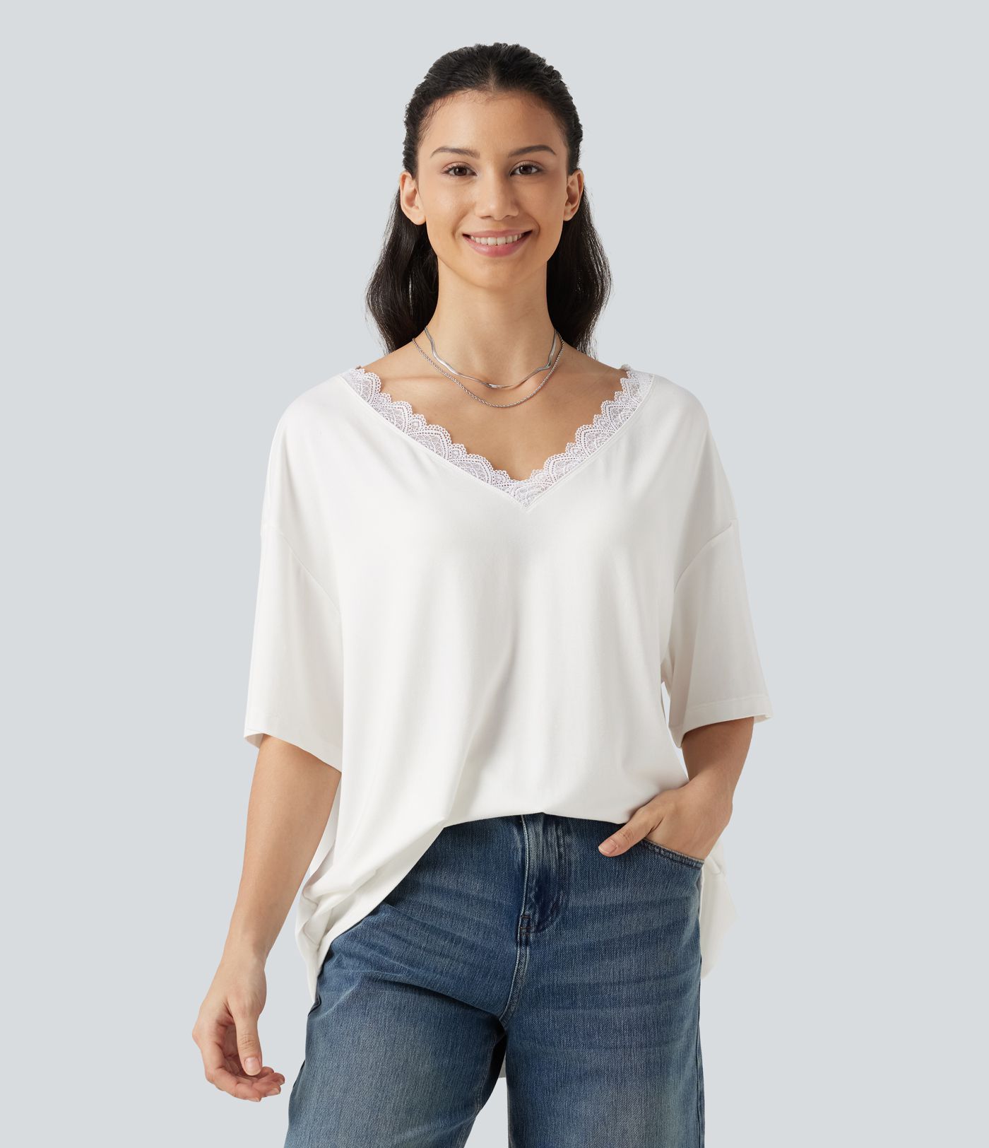 T-shirt décontracté à manches courtes, col en V, avec empiècements en résille contrastante