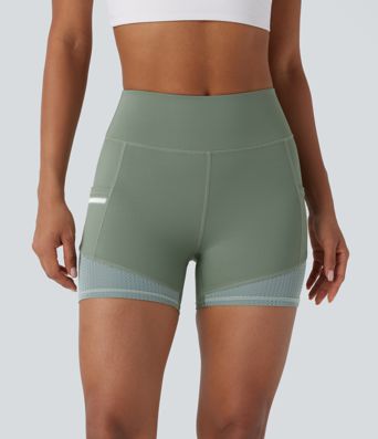 Short de sport SoftlyZero™ Airy taille haute 10 cm avec bandes réfléchissantes contrastées, empiècements ajourés et poches latérales à effet frais InstantCool