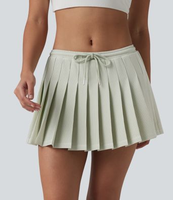 Jupe mini de pickleball plissée à rayures 2-en-1, taille basse, avec cordon de serrage et poches