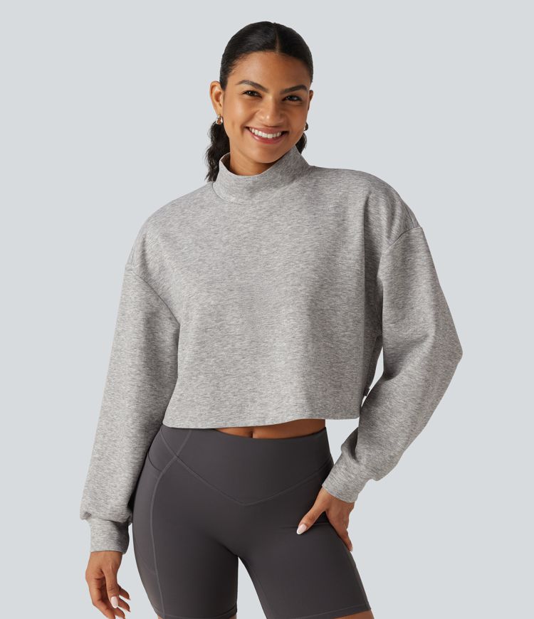 Lässiges, verkürztes Sweatshirt mit Stehkragen und langen Ärmeln Lässiges, verkürztes Sweatshirt mit Stehkragen und langen Ärmeln