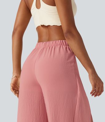 Pantalon ample fluide effet lin taille haute avec laçage Pantalon ample fluide effet lin taille haute avec laçage