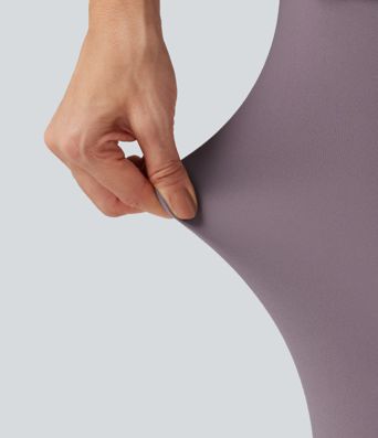 Legging-jupe de sport SoftlyZero™ taille haute croisée avec mesh contrasté et poches Legging-jupe de sport SoftlyZero™ taille haute croisée avec mesh contrasté et poches