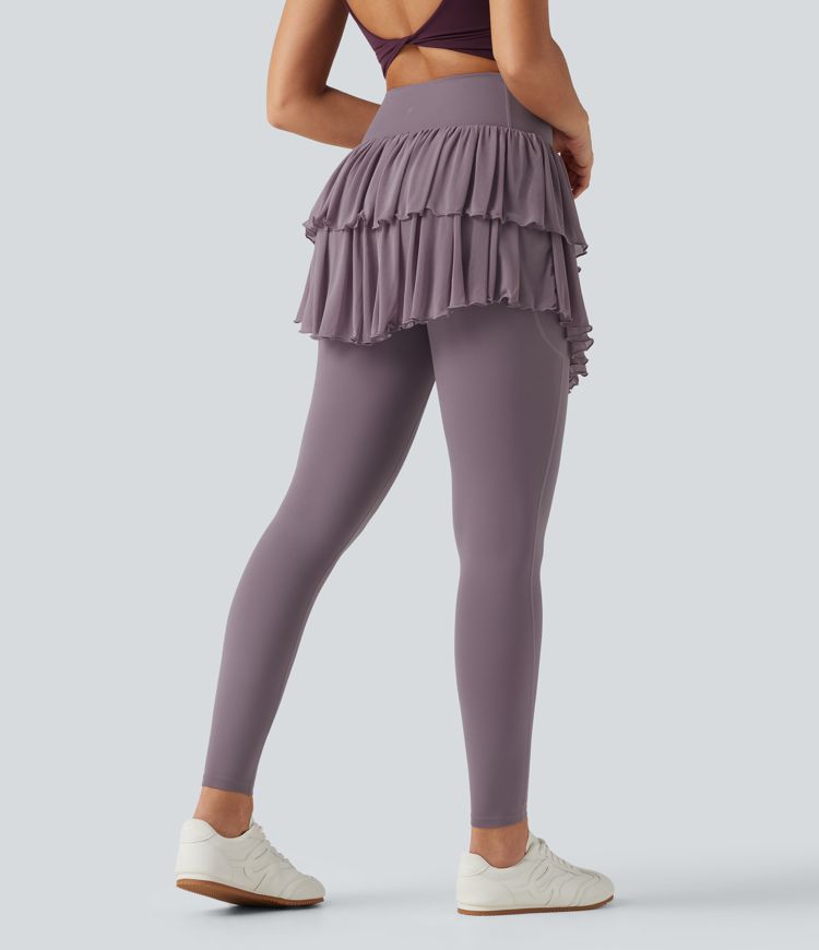 Legging-jupe de sport SoftlyZero™ taille haute croisée avec mesh contrasté et poches Legging-jupe de sport SoftlyZero™ taille haute croisée avec mesh contrasté et poches