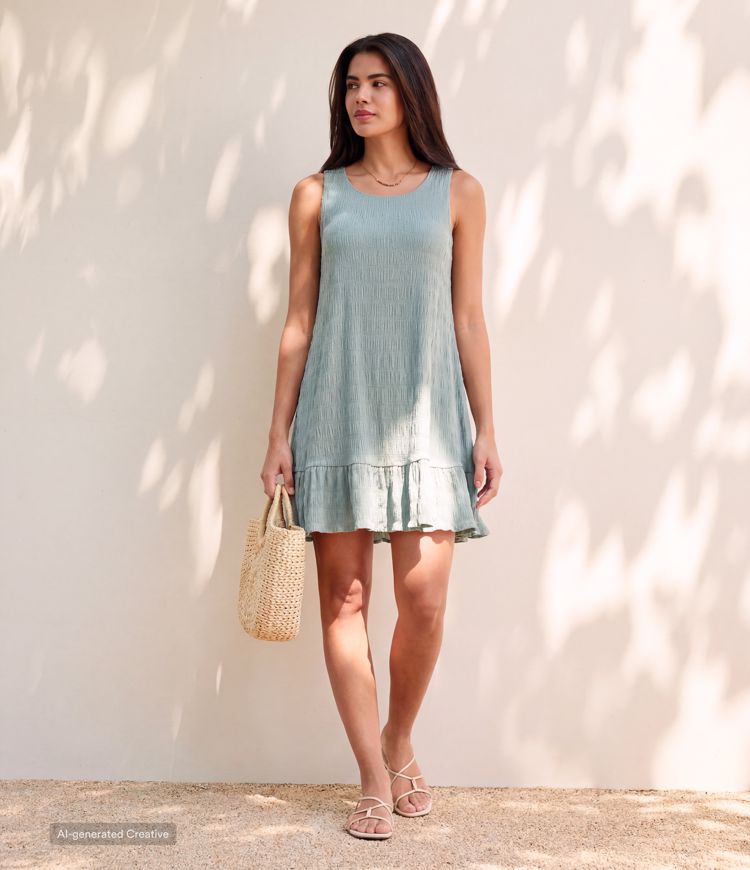 Robe courte décontractée sans manches à encolure ronde, avec soutien‑gorge intégré et ourlet à volants Robe courte décontractée sans manches à encolure ronde, avec soutien‑gorge intégré et ourlet à volants