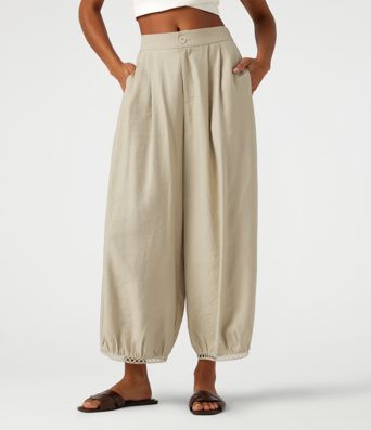 Pantalon mi‑taille décontracté à jambe en forme de baril, longueur 7/8, bordure ajourée en forme d'échelle, avec poches
