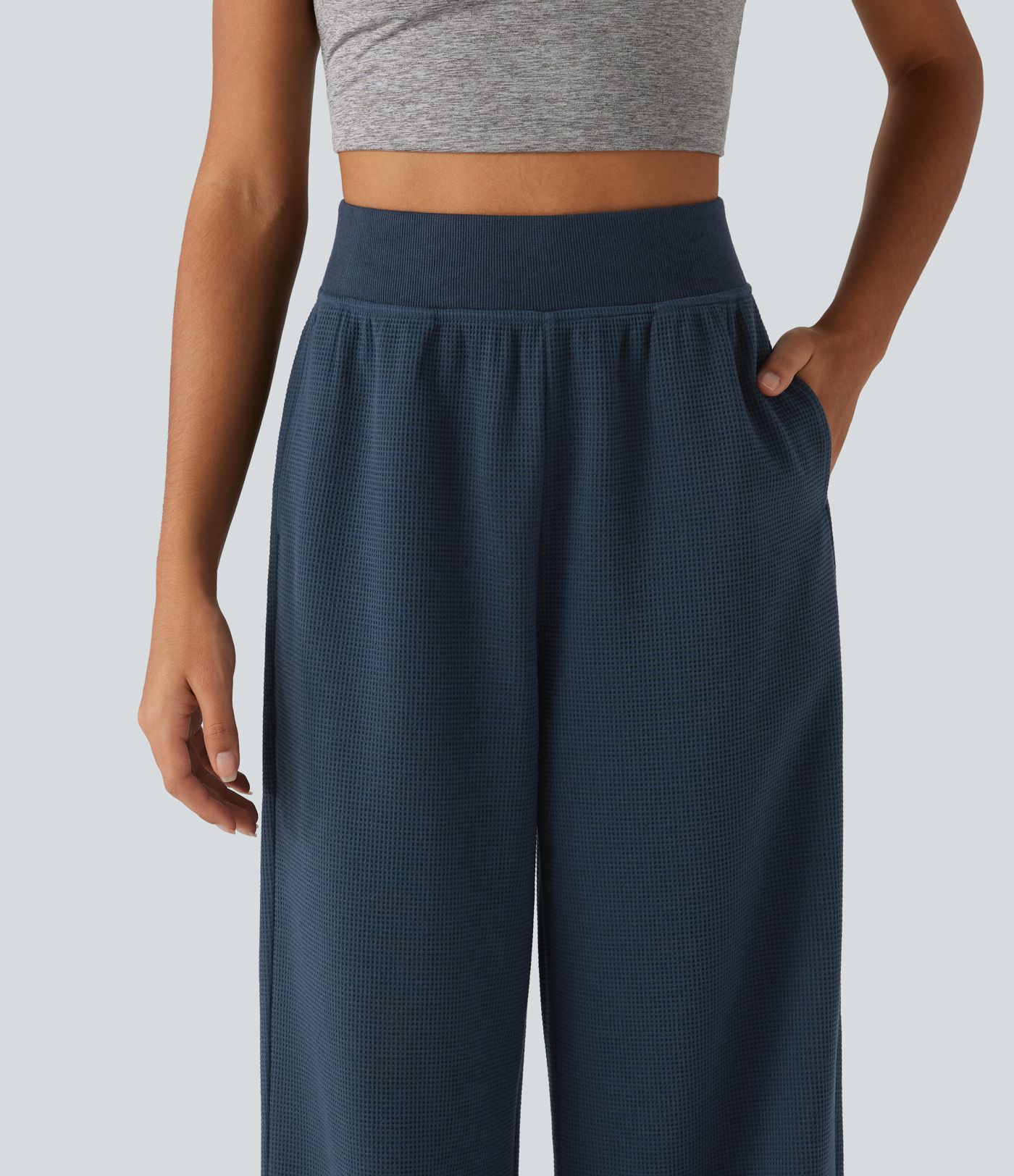 Lässige Sweatpants mit hohem Bund, Seitentaschen, Waffelstoff und geradem Bein Lässige Sweatpants mit hohem Bund, Seitentaschen, Waffelstoff und geradem Bein