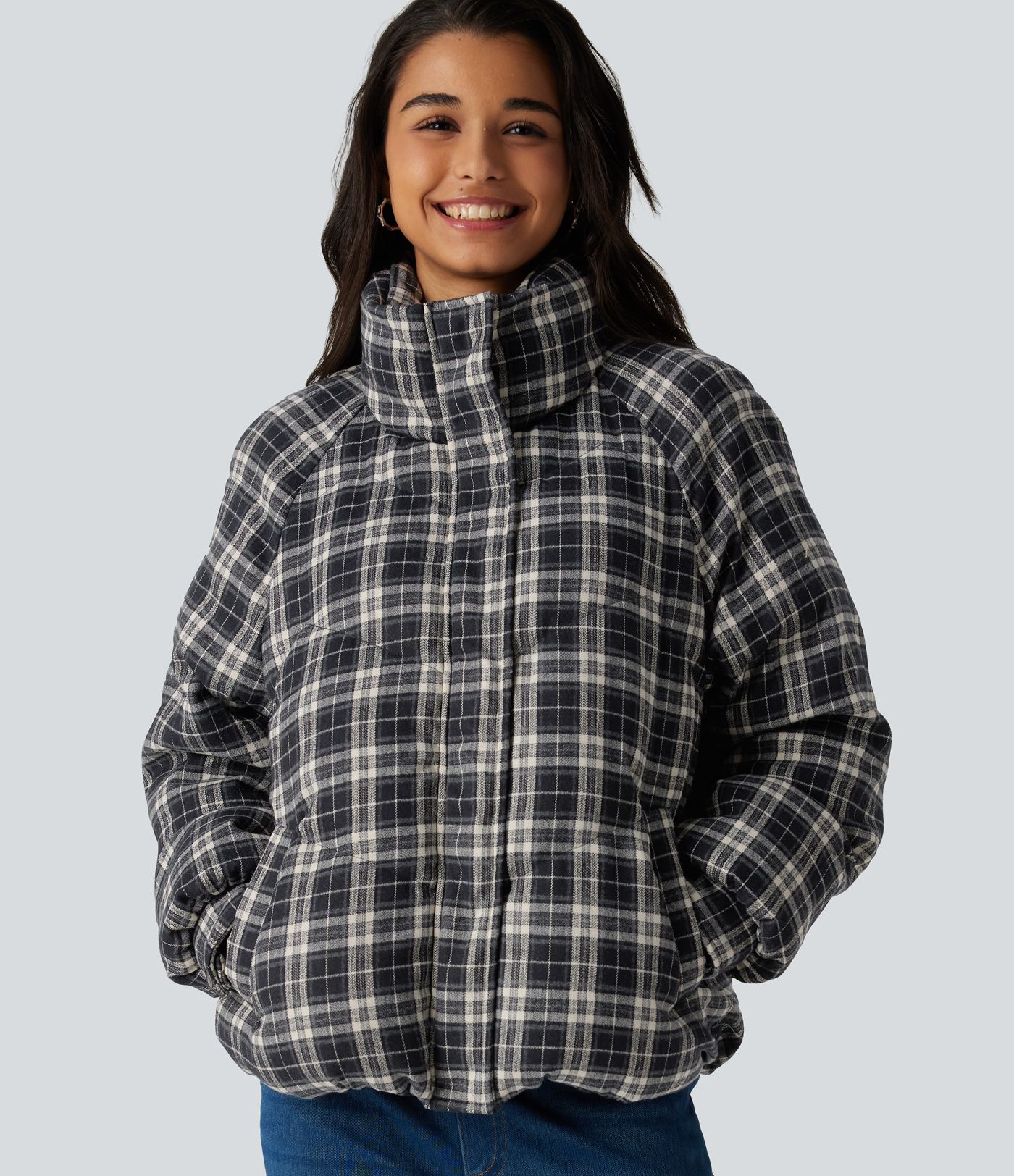 Veste matelassée à carreaux, col montant et manches longues avec poches Veste matelassée à carreaux, col montant et manches longues avec poches