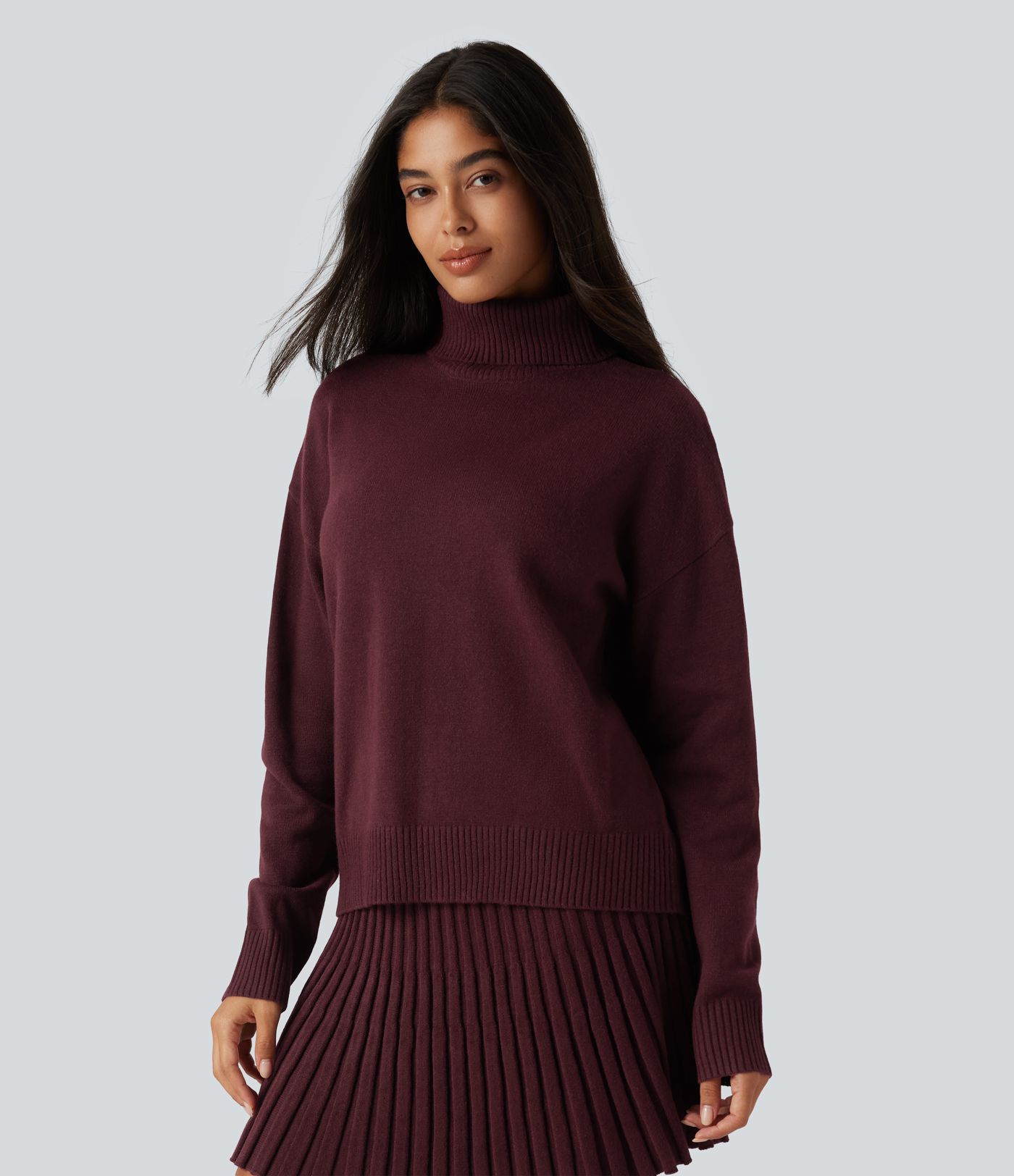 Lässiger Pullover mit hohem Kragen und langen Ärmeln Lässiger Pullover mit hohem Kragen und langen Ärmeln