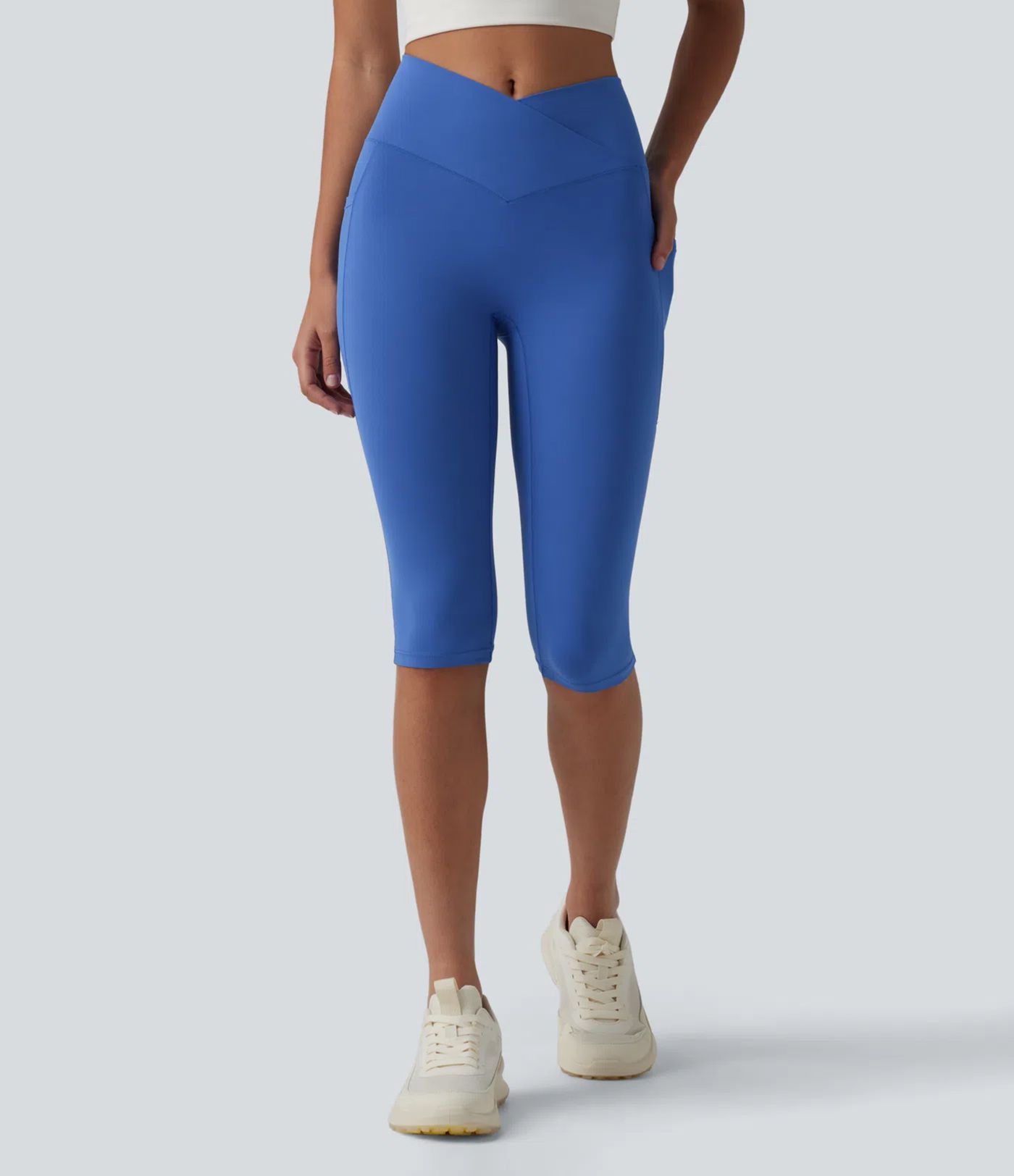 SoftlyZero™ High Waisted Crossover Pedal Pusher Yoga Leggings with Pockets SoftlyZero™ High Waisted Crossover Pedal Pusher Yoga Leggings with Pockets
