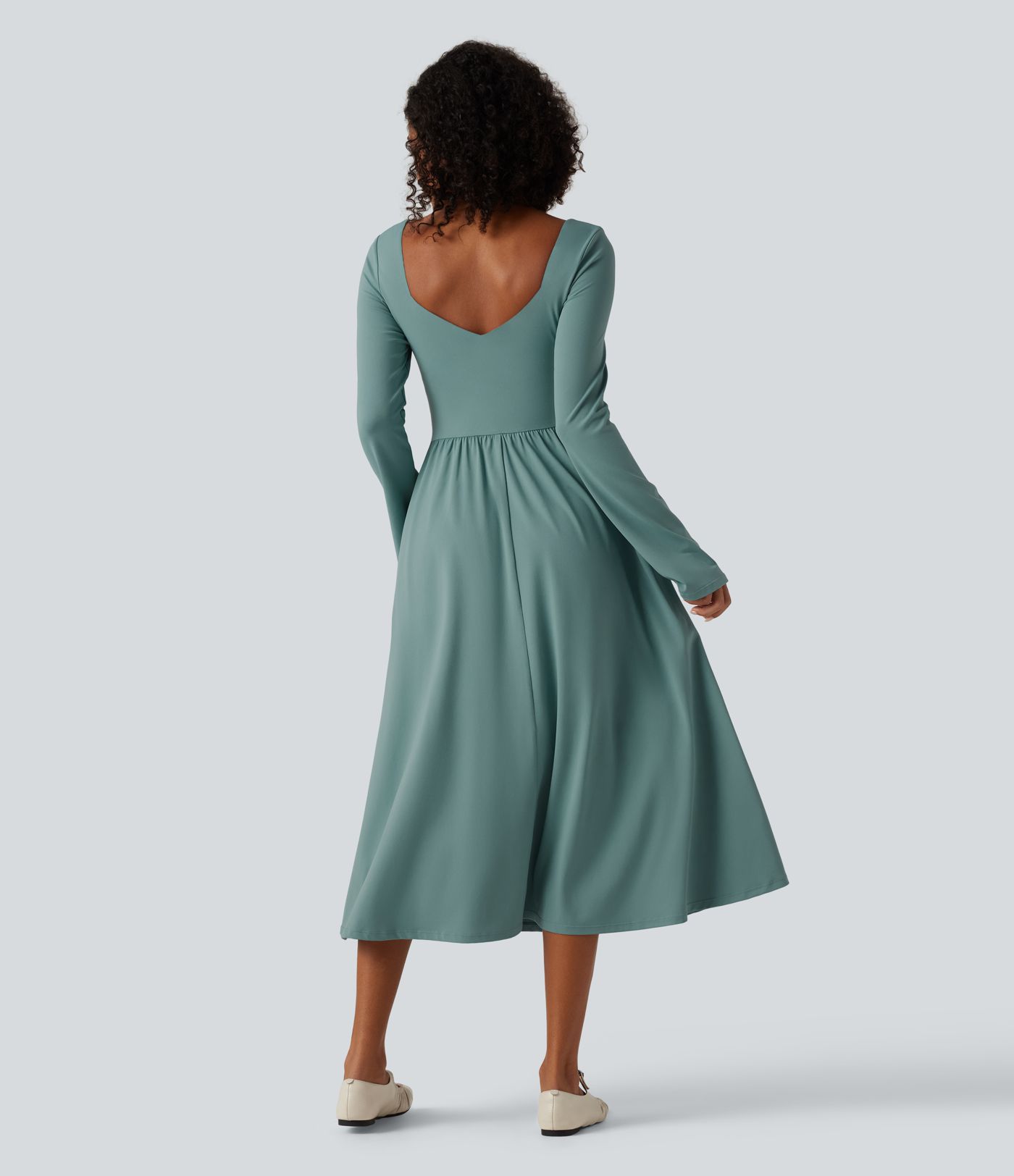 Vestido midi casual de manga larga con sujetador integrado, escote cruzado, corte fluido y bolsillos