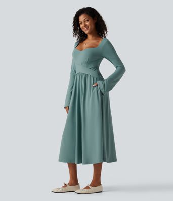 Vestido midi casual de manga larga con sujetador integrado, escote cruzado, corte fluido y bolsillos
