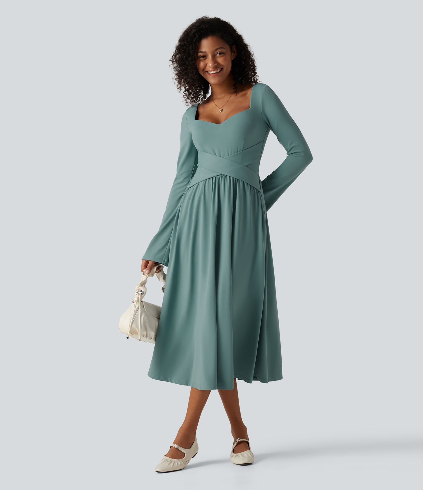 Vestido midi casual de manga larga con sujetador integrado, escote cruzado, corte fluido y bolsillos