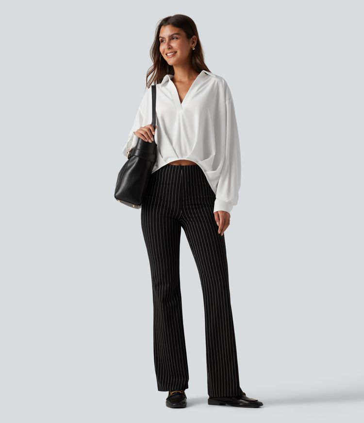 Bluse mit Kragen, langen Ärmeln und abgerundetem Saum Bluse mit Kragen, langen Ärmeln und abgerundetem Saum