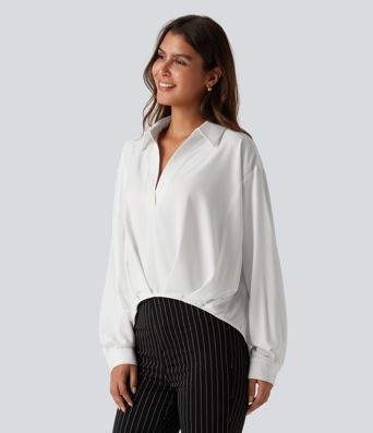 Bluse mit Kragen, langen Ärmeln und abgerundetem Saum Bluse mit Kragen, langen Ärmeln und abgerundetem Saum
