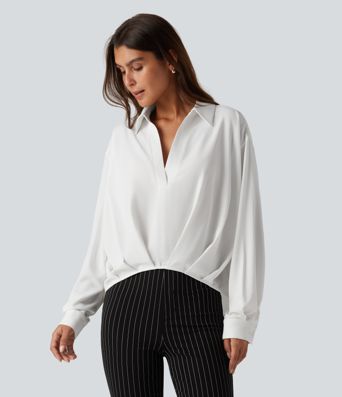 Bluse mit Kragen, langen Ärmeln und abgerundetem Saum Bluse mit Kragen, langen Ärmeln und abgerundetem Saum