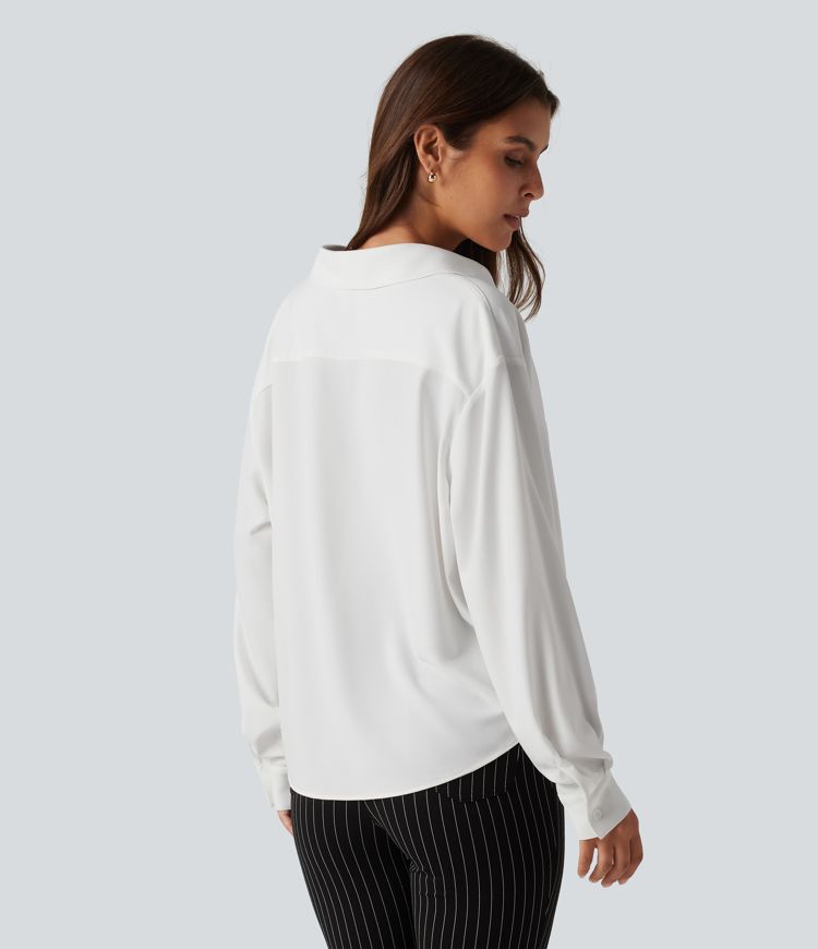 Bluse mit Kragen, langen Ärmeln und abgerundetem Saum Bluse mit Kragen, langen Ärmeln und abgerundetem Saum
