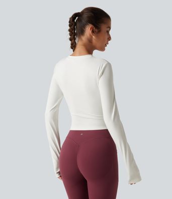 Gerafftes Yoga-Sport-Top mit Rundhalsausschnitt, langen Ärmeln und Daumenlöchern Gerafftes Yoga-Sport-Top mit Rundhalsausschnitt, langen Ärmeln und Daumenlöchern