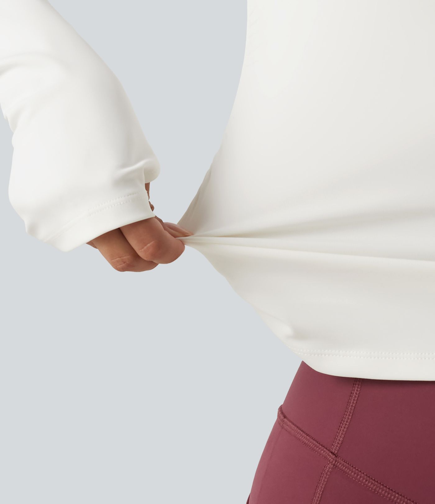 Gerafftes Yoga-Sport-Top mit Rundhalsausschnitt, langen Ärmeln und Daumenlöchern Gerafftes Yoga-Sport-Top mit Rundhalsausschnitt, langen Ärmeln und Daumenlöchern