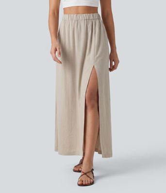 Falda maxi de talle alto con abertura en el bajo, efecto lino, estilo casual y bolsillos.