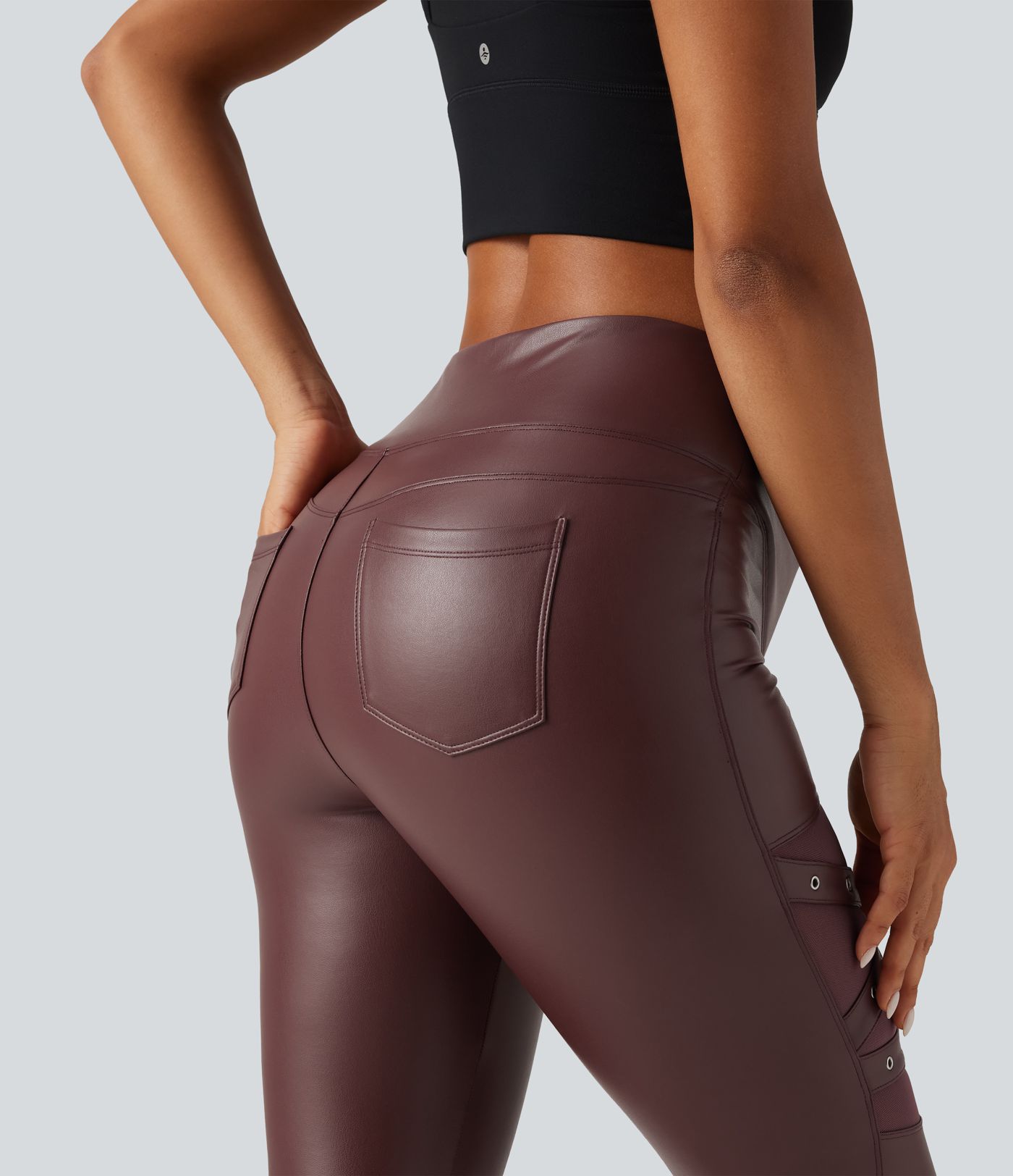 Legging en simili stretch doublé polaire taille haute croisée gainant avec poches Legging en simili stretch doublé polaire taille haute croisée gainant avec poches