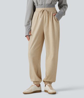 Lässige Jogginghose mit hohem Bund, Seitentaschen und Kordelzug Lässige Jogginghose mit hohem Bund, Seitentaschen und Kordelzug