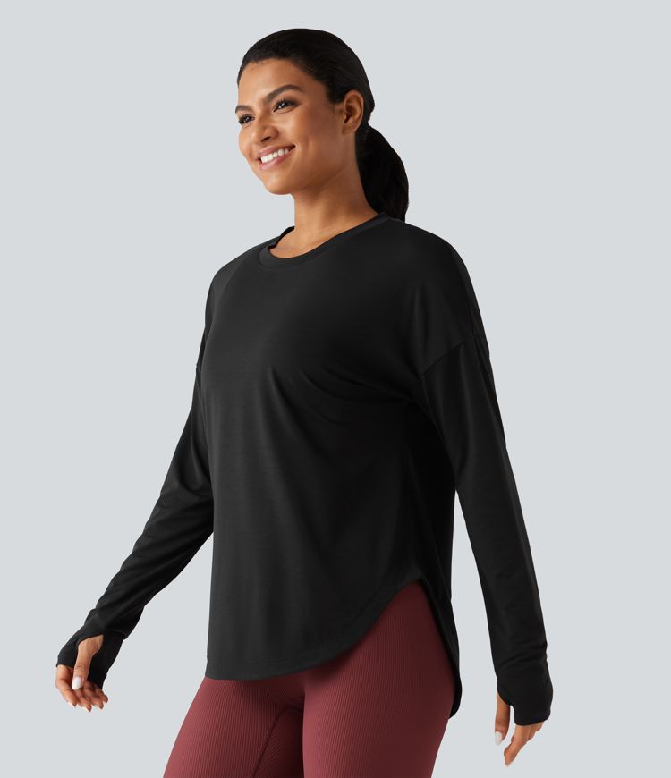 Haut de sport yoga à séchage rapide, encolure arrondie, manches longues avec passe-pouces et brassière intégrée Haut de sport yoga à séchage rapide, encolure arrondie, manches longues avec passe-pouces et brassière intégrée