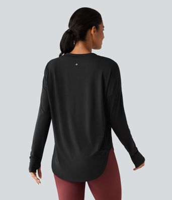 Haut de sport yoga à séchage rapide, encolure arrondie, manches longues avec passe-pouces et brassière intégrée Haut de sport yoga à séchage rapide, encolure arrondie, manches longues avec passe-pouces et brassière intégrée