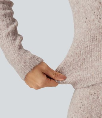 Lässiger Pullover aus offenem Strick mit V-Ausschnitt, langen Ärmeln und Muschelsaum Lässiger Pullover aus offenem Strick mit V-Ausschnitt, langen Ärmeln und Muschelsaum