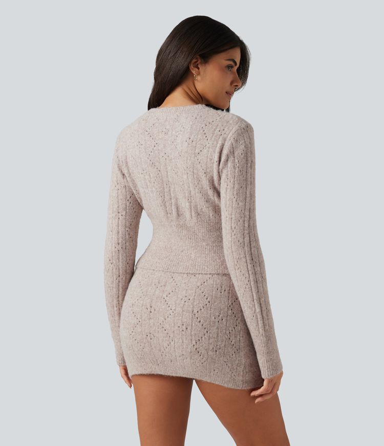 Lässiger Pullover aus offenem Strick mit V-Ausschnitt, langen Ärmeln und Muschelsaum Lässiger Pullover aus offenem Strick mit V-Ausschnitt, langen Ärmeln und Muschelsaum