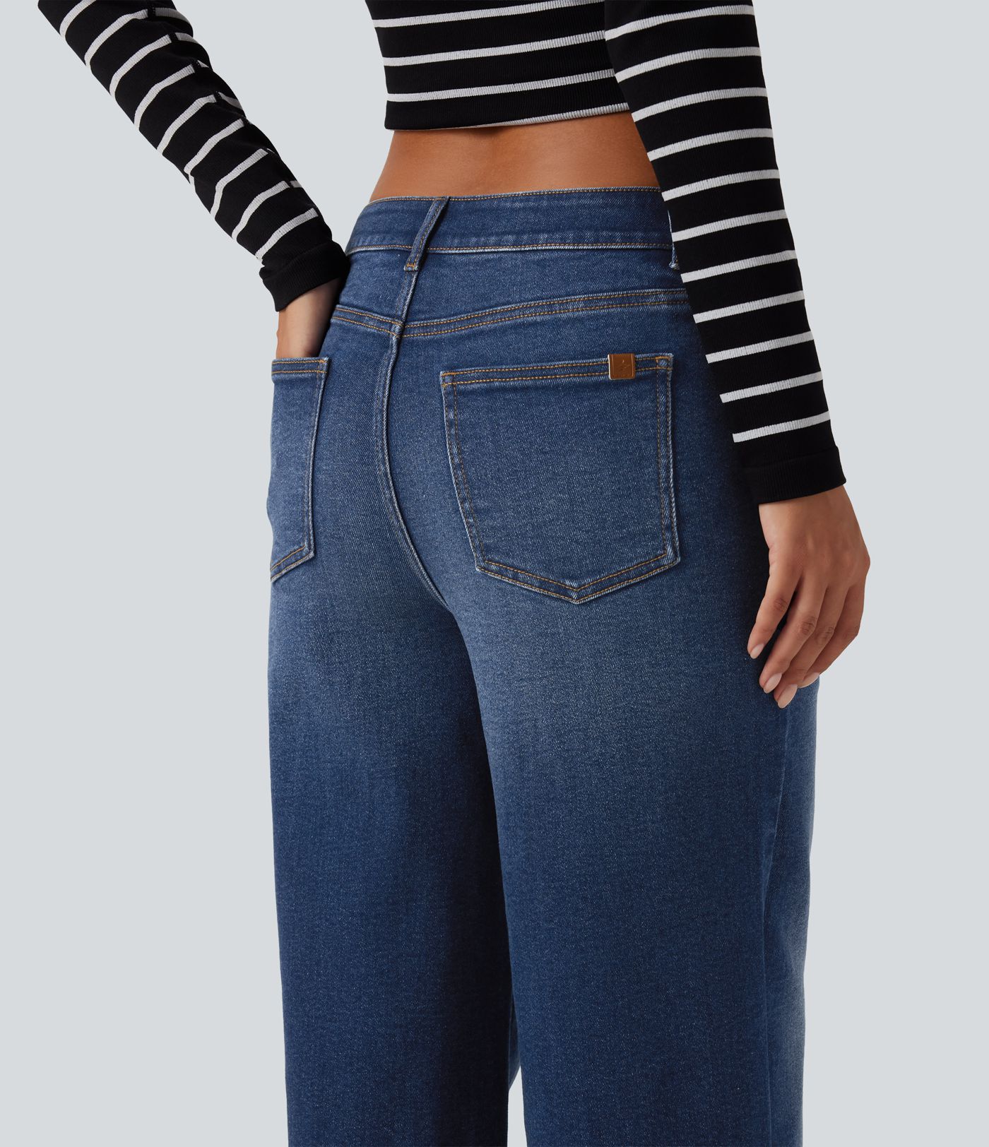 Jean délavé taille mi-haute à jambe large, style décontracté, avec poches